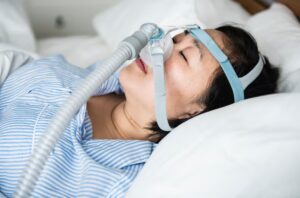 woman-wearing-anti-snoring-chin-straps_53876-146068 (2) snoring dental treatment